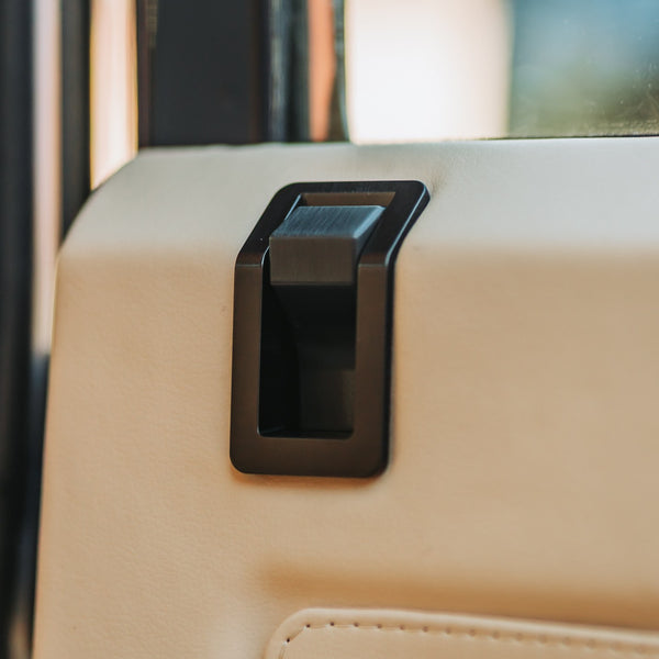 Land Rover Defender Door Lock Escutcheon - Black, fitted on a Land Rover Defender