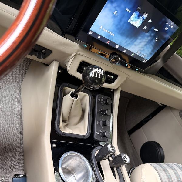 Driver view down the center console to the Kenwood head unit