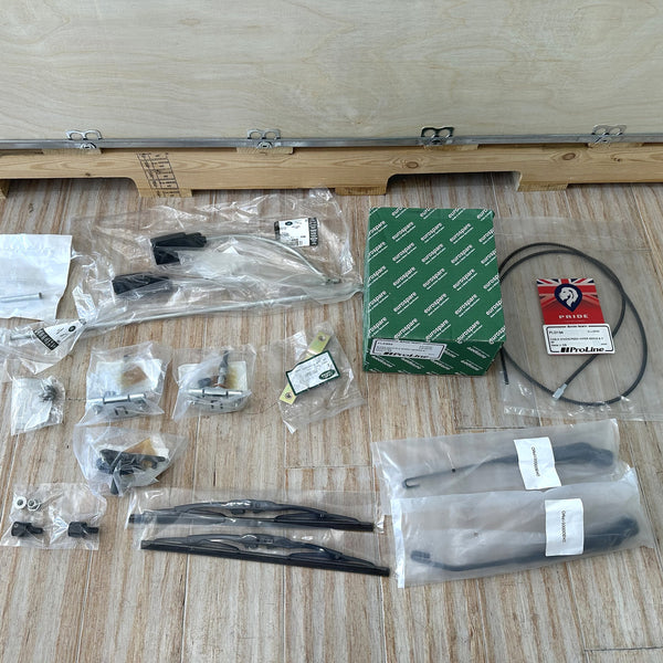 Wiper motor, cables, arms and blades as supplied