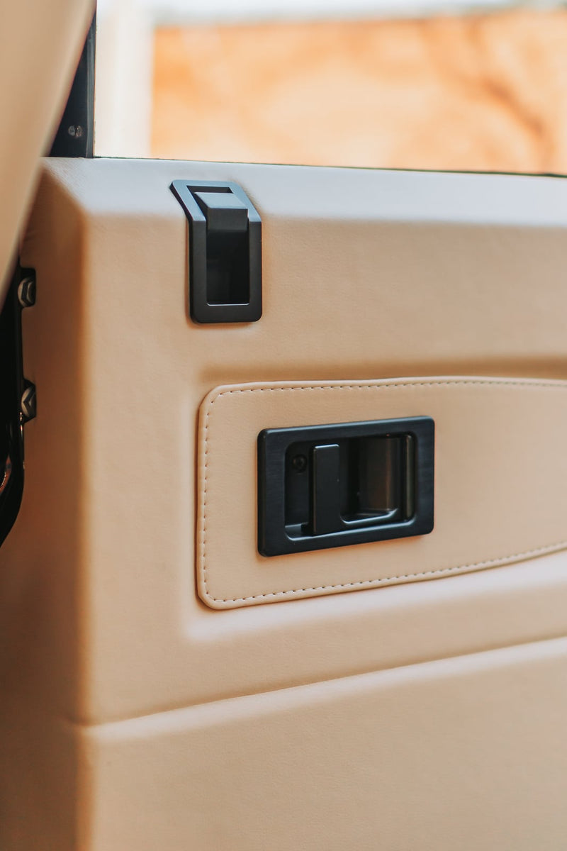 Land Rover Defender Door Lock Escutcheon - Black, fitted on a Land Rover Defender