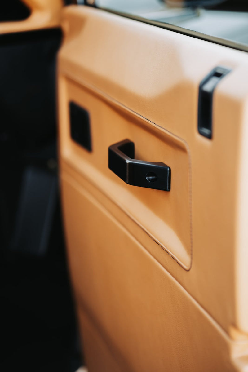 Land Rover Defender Door Lock Escutcheon - Black, fitted on a Land Rover Defender